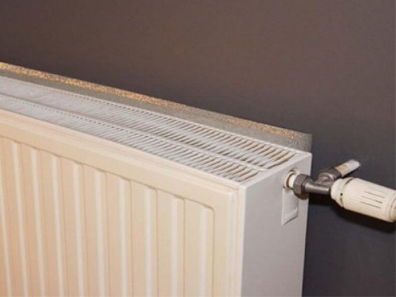Film isolant derrière le radiateur